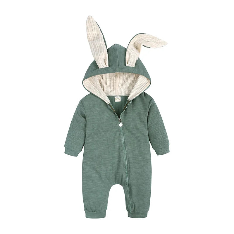 Green baby onesie with bunny ears on a white background