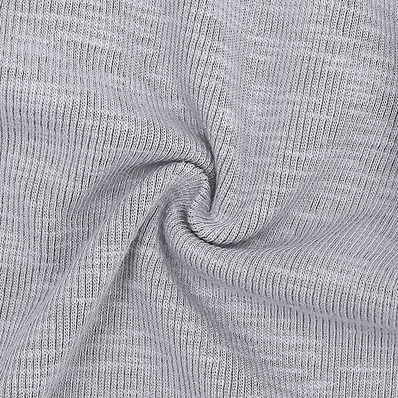 Close-up of gray ribbed fabric with a swirl pattern