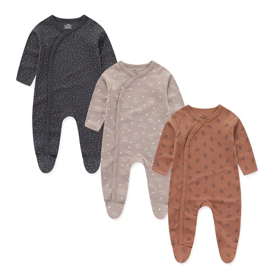 Three baby onesies in black, gray, and brown on a white background