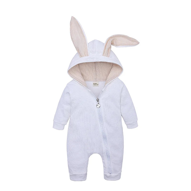 Baby onesie with bunny ears and ears on a white background